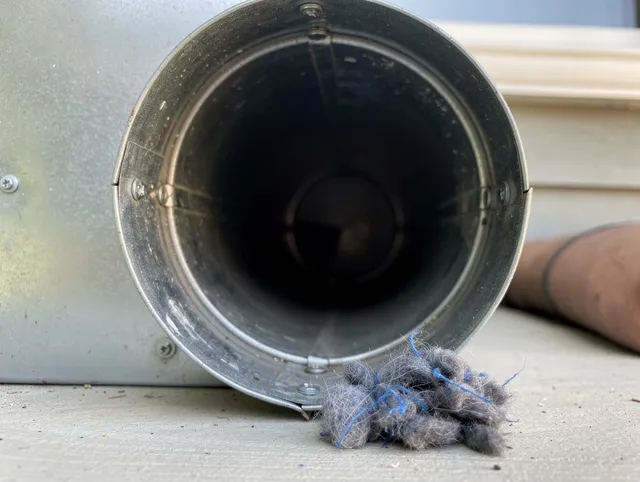 Wadsworth Dryer Vent Cleaning technician using specialized equipment to clear severe dryer vent blockage in Wadsworth